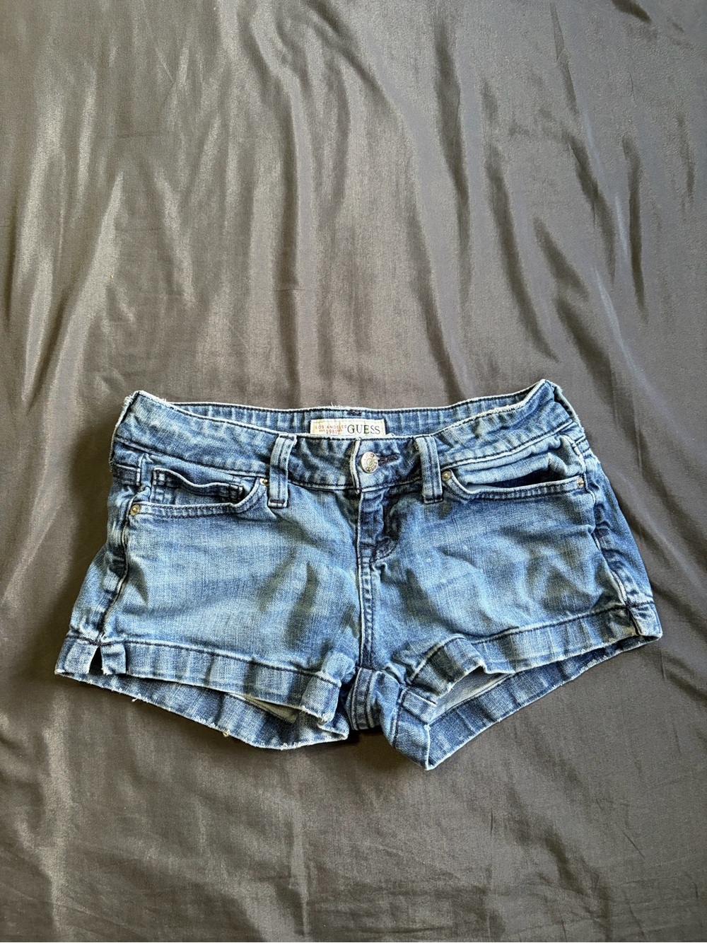 Y2k 2000s Guess dark blue denim low rise mini shorts. Size 25.